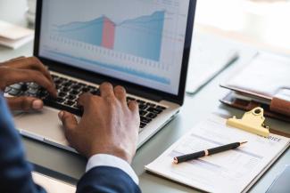 Laptop with graphs.